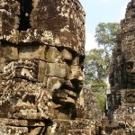 Angkor wat head statues